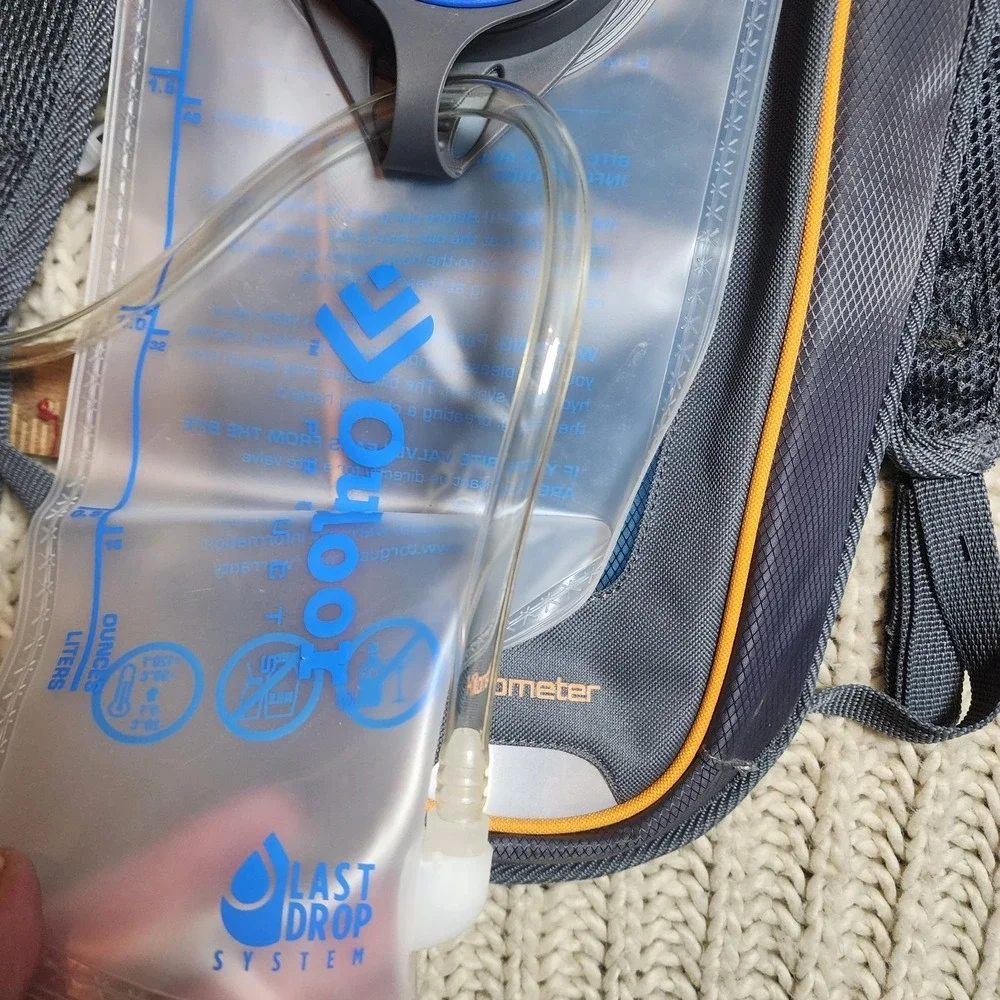 NWOT 2L Water Outdoor Prod Bladder Bag Hydration Backpack Hiking Camping Cycling